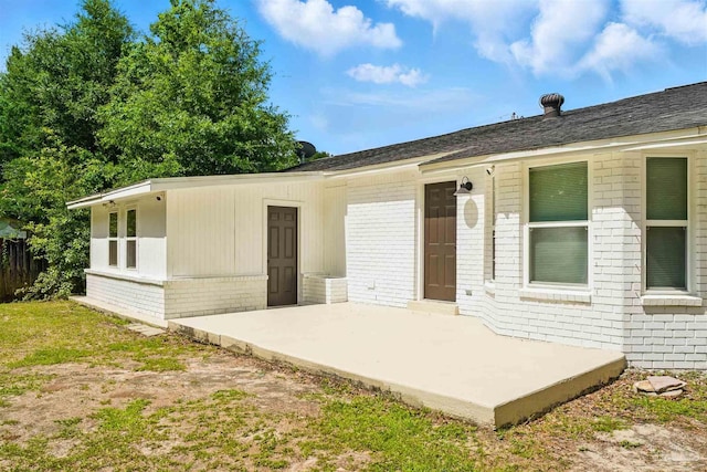 4248 Seaport Rd, Pace, FL 32571 - view of front of property featuring a patio area and brick siding
