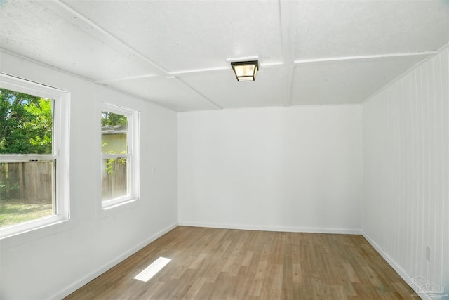 4248 Seaport Rd, Pace, FL 32571 - empty room featuring wood finished floors and baseboards