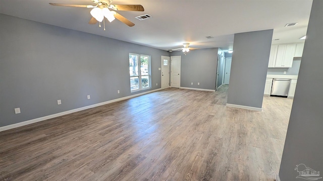 unfurnished living room with ceiling fan and light hardwood / wood-style floors