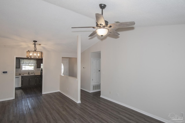 interior space with baseboards, dark wood finished floors, and a sink