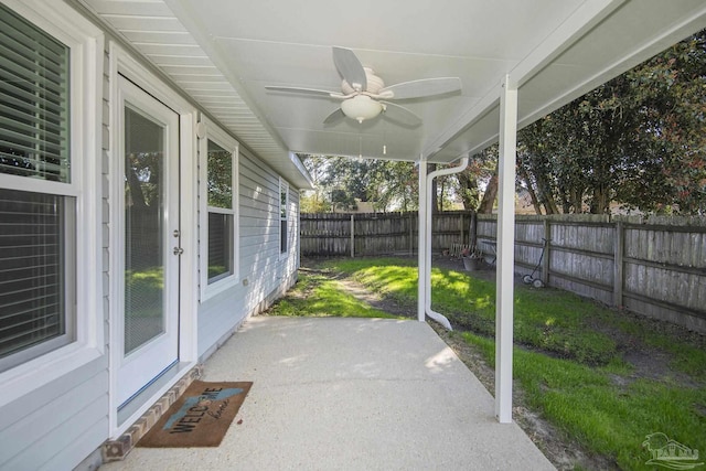 view of patio featuring a fenced backyard and ceiling fan