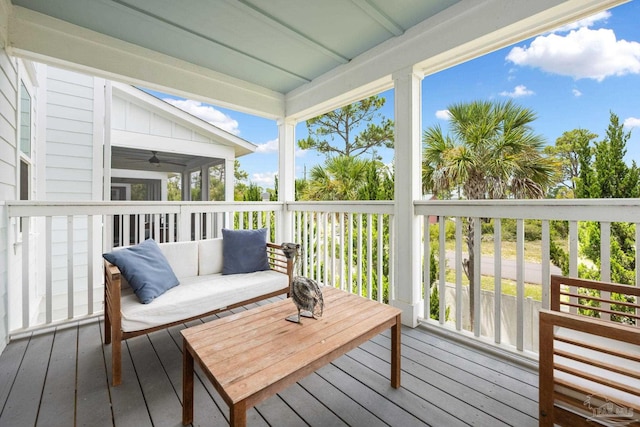 wooden terrace with ceiling fan