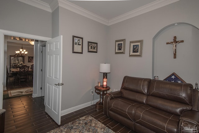 living room featuring crown molding and a notable chandelier