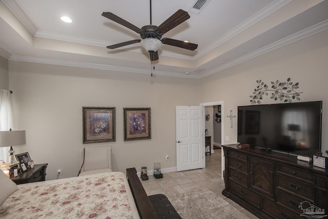 bedroom with crown molding, ceiling fan, and a raised ceiling