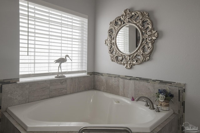 bathroom featuring a relaxing tiled tub