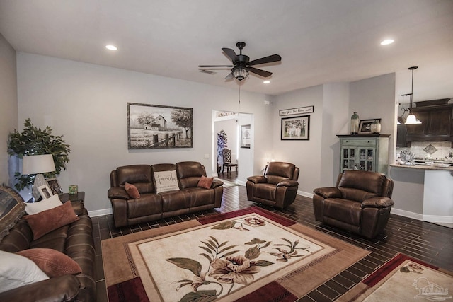 living room with ceiling fan