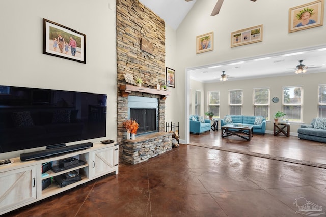 living room featuring a stone fireplace and high vaulted ceiling