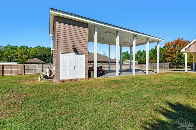 exterior space with a patio and a yard