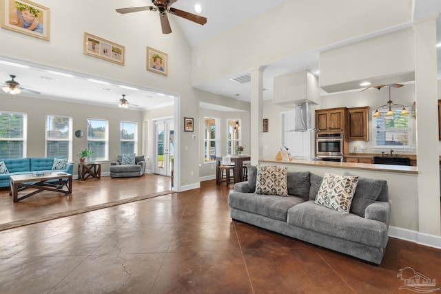 living room featuring high vaulted ceiling and ceiling fan