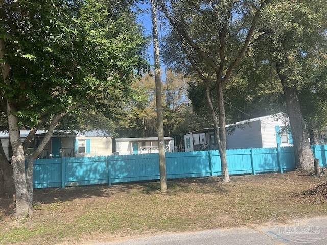 view of swimming pool with fence