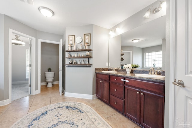 6018 Autumn Pines Cir, Pace, FL 32571 - bathroom featuring double vanity, tile patterned floors, and a sink