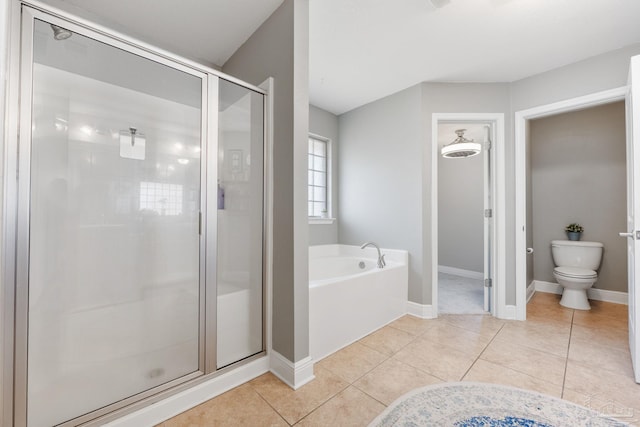 6018 Autumn Pines Cir, Pace, FL 32571 - full bathroom with a shower stall, a garden tub, toilet, and tile patterned floors