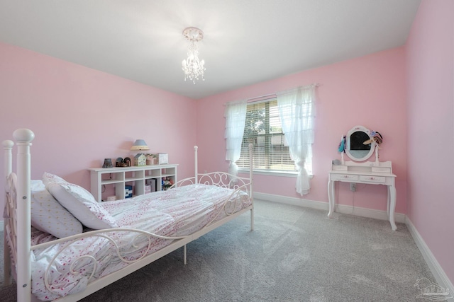 6018 Autumn Pines Cir, Pace, FL 32571 - bedroom with baseboards, a chandelier, and carpet