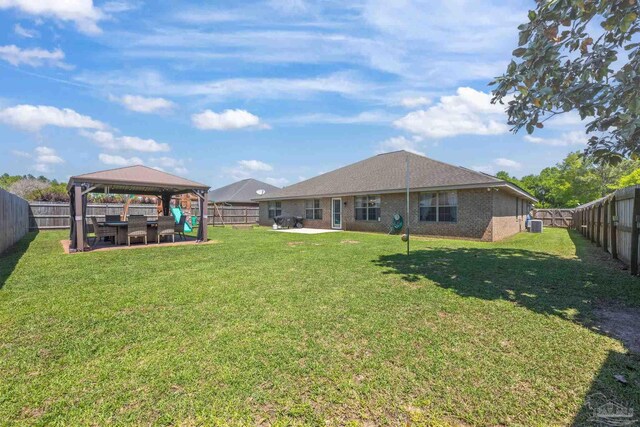 6018 Autumn Pines Cir, Pace, FL 32571 - view of yard with a fenced backyard, a gazebo, and a patio