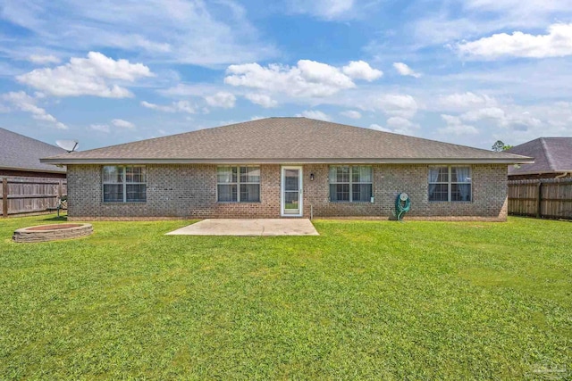 6018 Autumn Pines Cir, Pace, FL 32571 - rear view of house featuring a yard, a patio area, and a fenced backyard