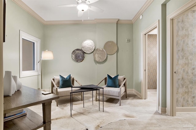 living area featuring crown molding and ceiling fan