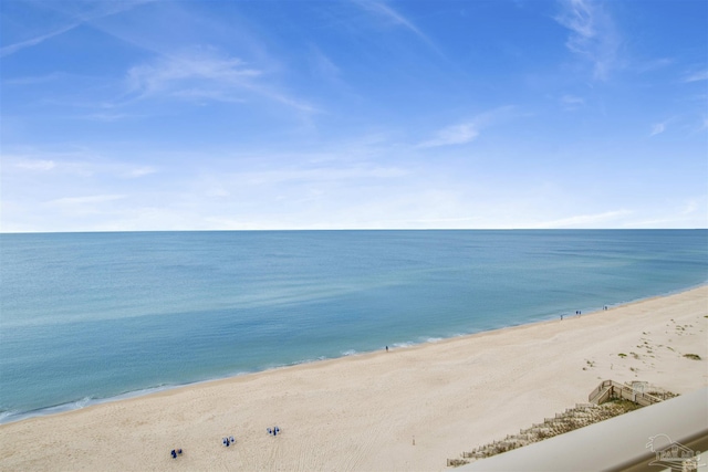 view of water feature with a beach view