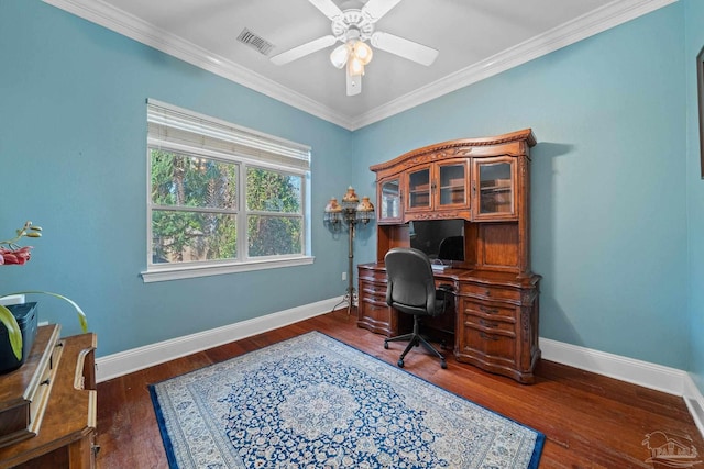 office area with dark wood-type flooring, ceiling fan, and ornamental molding