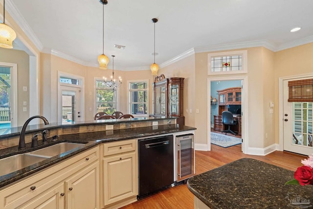 kitchen with wine cooler, dark stone counters, dishwasher, light hardwood / wood-style floors, and sink