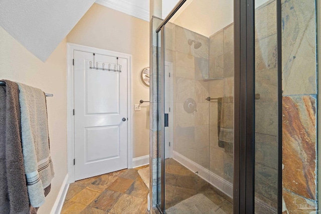 bathroom with tile patterned flooring, a shower with door, and a textured ceiling