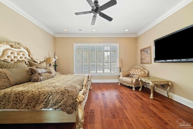 bedroom with ornamental molding, ceiling fan, and hardwood / wood-style floors