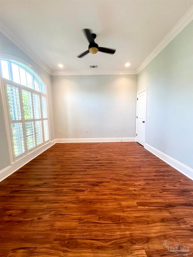 unfurnished room featuring ceiling fan, crown molding, and hardwood / wood-style flooring