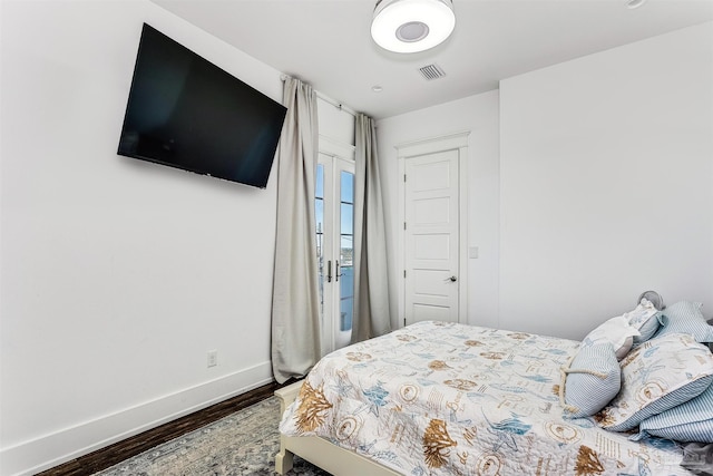 bedroom featuring hardwood / wood-style floors