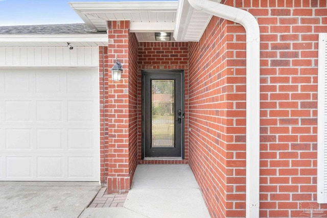 property entrance with a garage