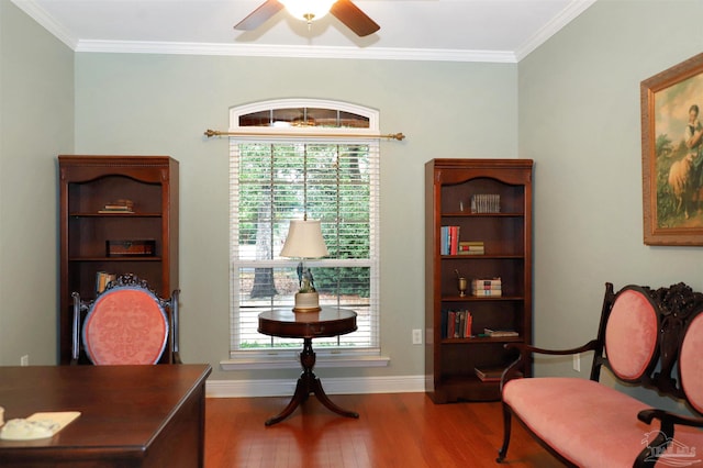 home office featuring hardwood / wood-style floors, ornamental molding, and ceiling fan