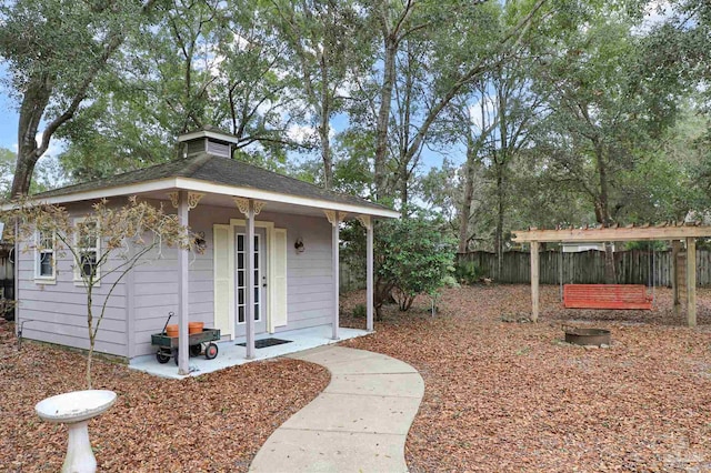 exterior space with an outbuilding