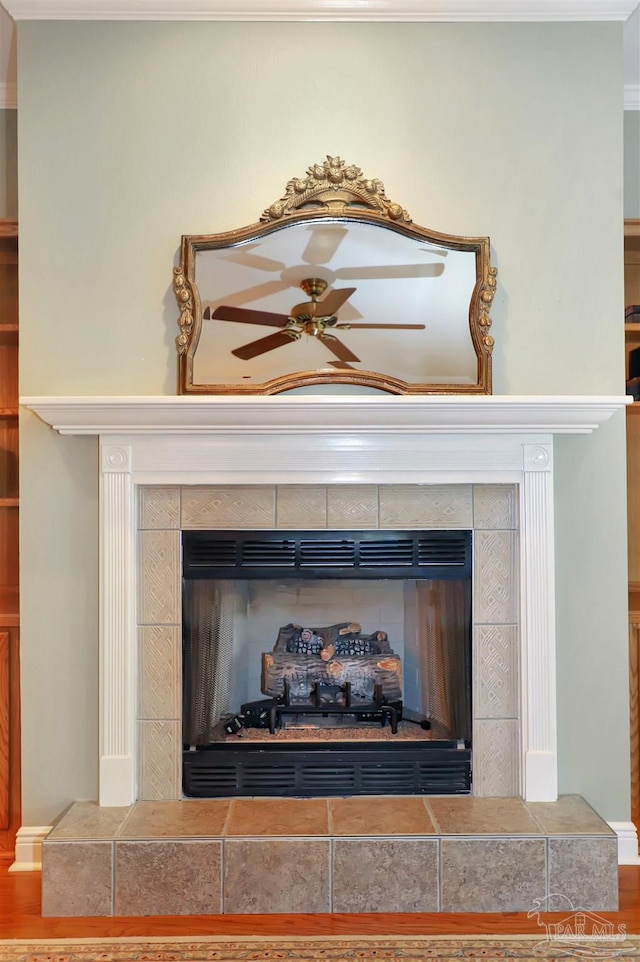 details with a tile fireplace