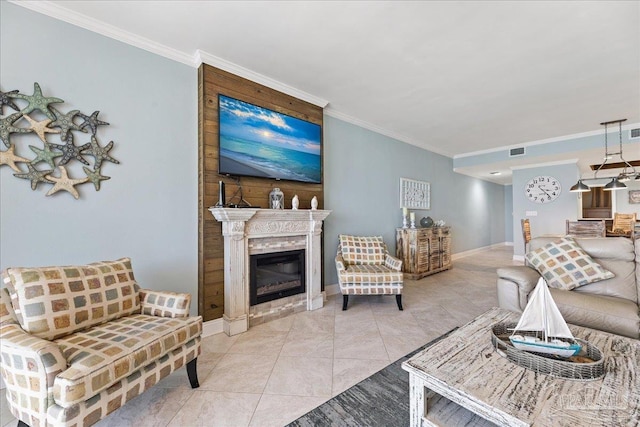 living room with crown molding and tile patterned floors