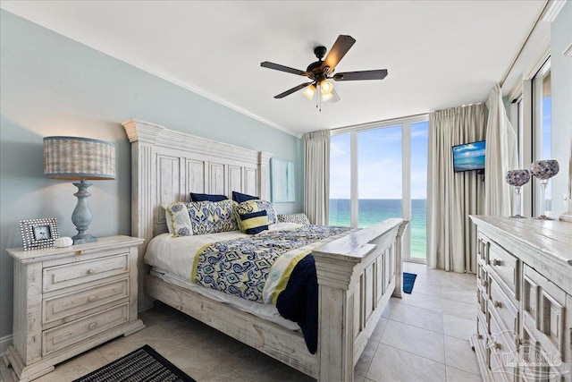 bedroom featuring a wall of windows, access to outside, light tile patterned floors, ceiling fan, and crown molding