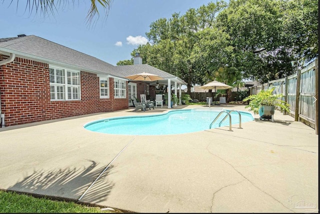1707 Cedrus Ln, Pensacola, FL 32514 - view of swimming pool featuring a patio and a fenced backyard