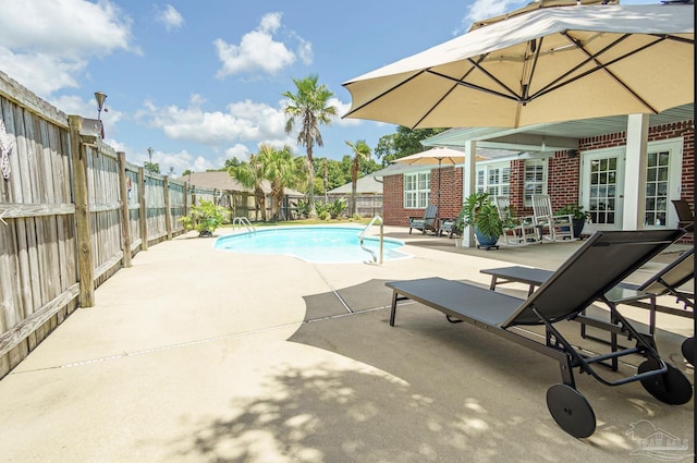 1707 Cedrus Ln, Pensacola, FL 32514 - view of swimming pool with a patio area and a fenced backyard
