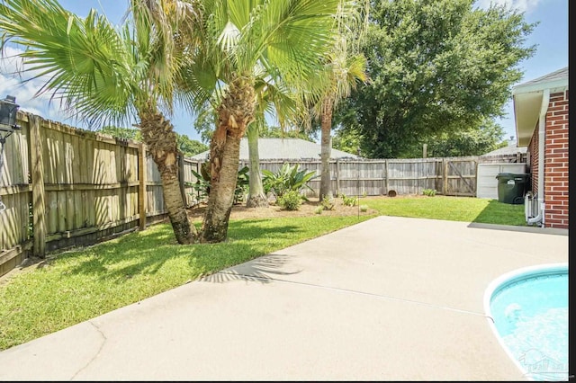 1707 Cedrus Ln, Pensacola, FL 32514 - fenced backyard with a patio