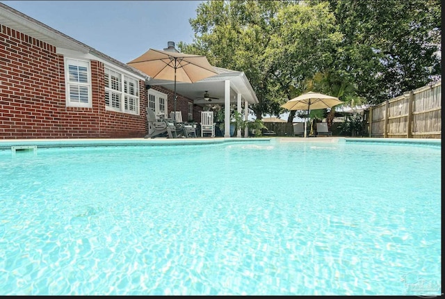 1707 Cedrus Ln, Pensacola, FL 32514 - view of swimming pool featuring ceiling fan and french doors