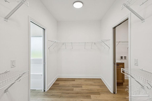 605 Ard Field Rd, Jay, FL 32565 - spacious closet featuring light wood-style flooring