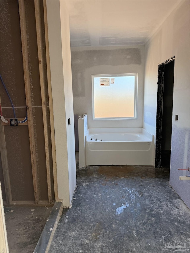 bathroom featuring a garden tub