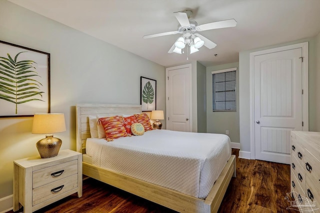 bedroom featuring dark hardwood / wood-style floors and ceiling fan