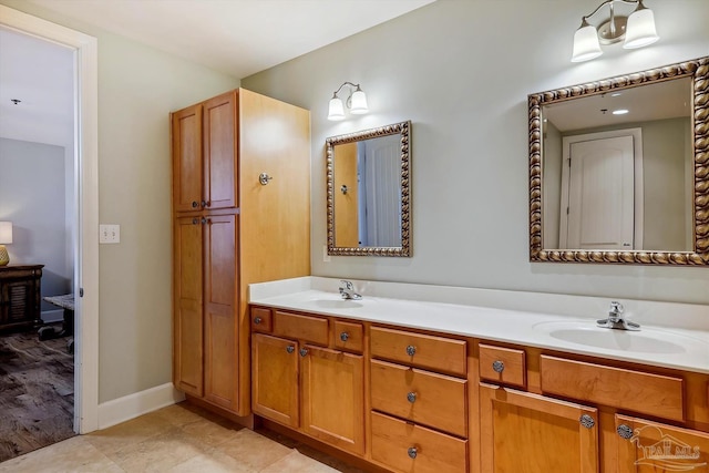 bathroom with vanity and tile patterned floors