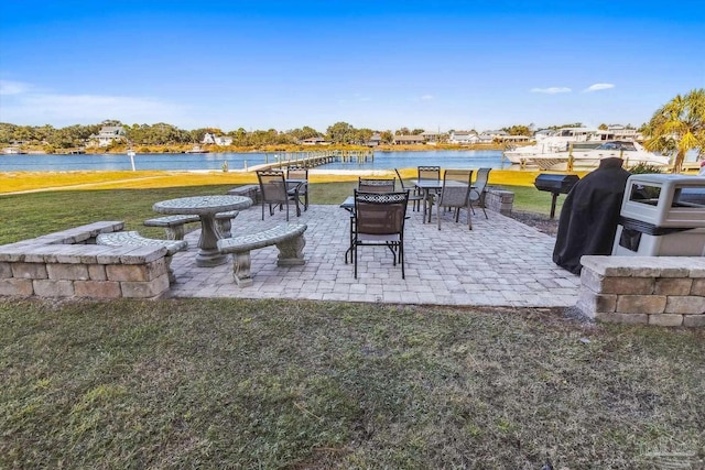 view of patio / terrace with a water view