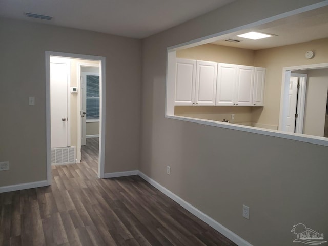 interior space featuring dark hardwood / wood-style flooring