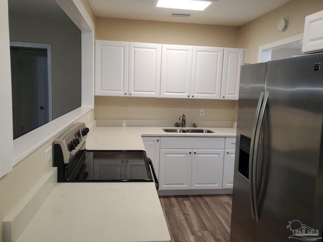 kitchen featuring dark wood-type flooring, white cabinets, sink, range with electric cooktop, and stainless steel fridge with ice dispenser