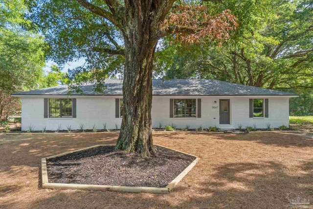 5547 Kauffman Rd, Milton, FL 32583 - ranch-style house featuring brick siding and roof with shingles
