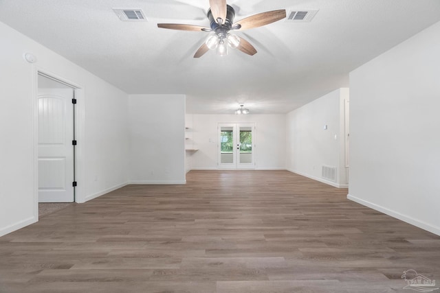 5547 Kauffman Rd, Milton, FL 32583 - spare room featuring a ceiling fan, wood finished floors, and baseboards