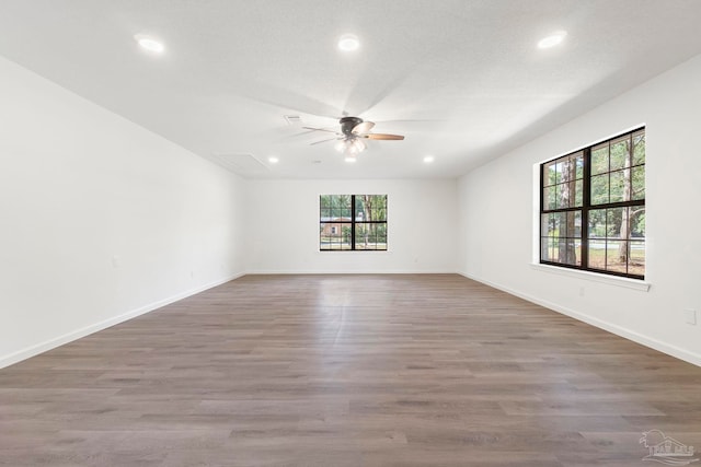 5547 Kauffman Rd, Milton, FL 32583 - empty room with a ceiling fan, recessed lighting, baseboards, and wood finished floors
