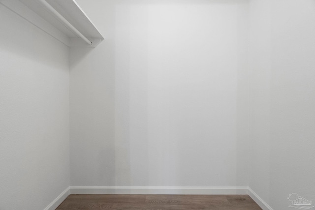 5547 Kauffman Rd, Milton, FL 32583 - spacious closet featuring dark wood-style floors