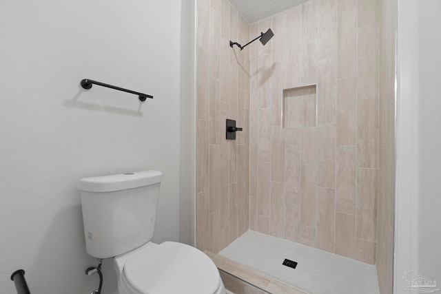 5547 Kauffman Rd, Milton, FL 32583 - full bath featuring toilet and a tile shower
