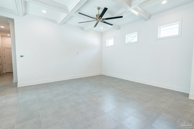 unfurnished room featuring ceiling fan, coffered ceiling, and beam ceiling